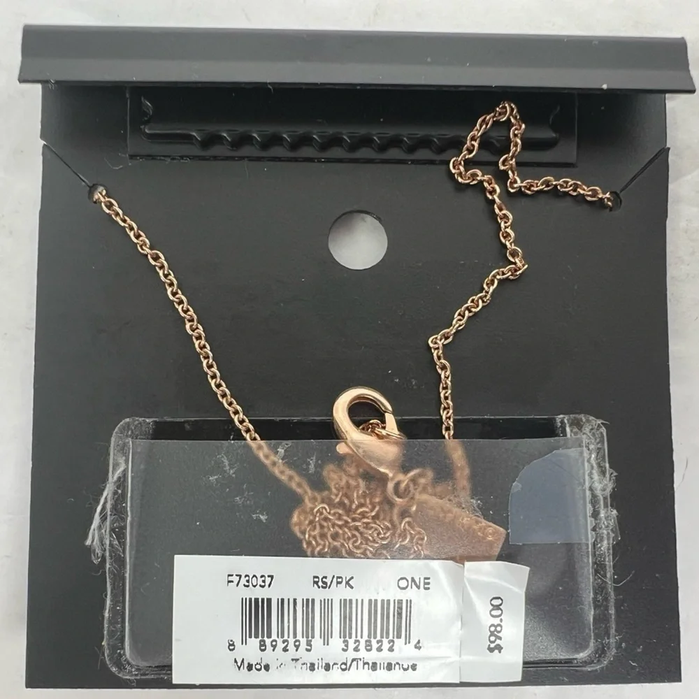 COACH PINK ROSE GOLD EMERALD CUT CRYSTAL NECKLACE (COACH F73037)